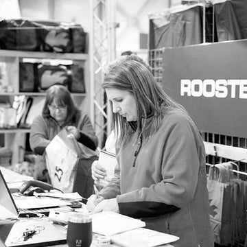 a photo of finance direct sorting money for a show