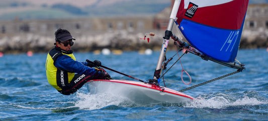 Harri Clark sailing in his Topper