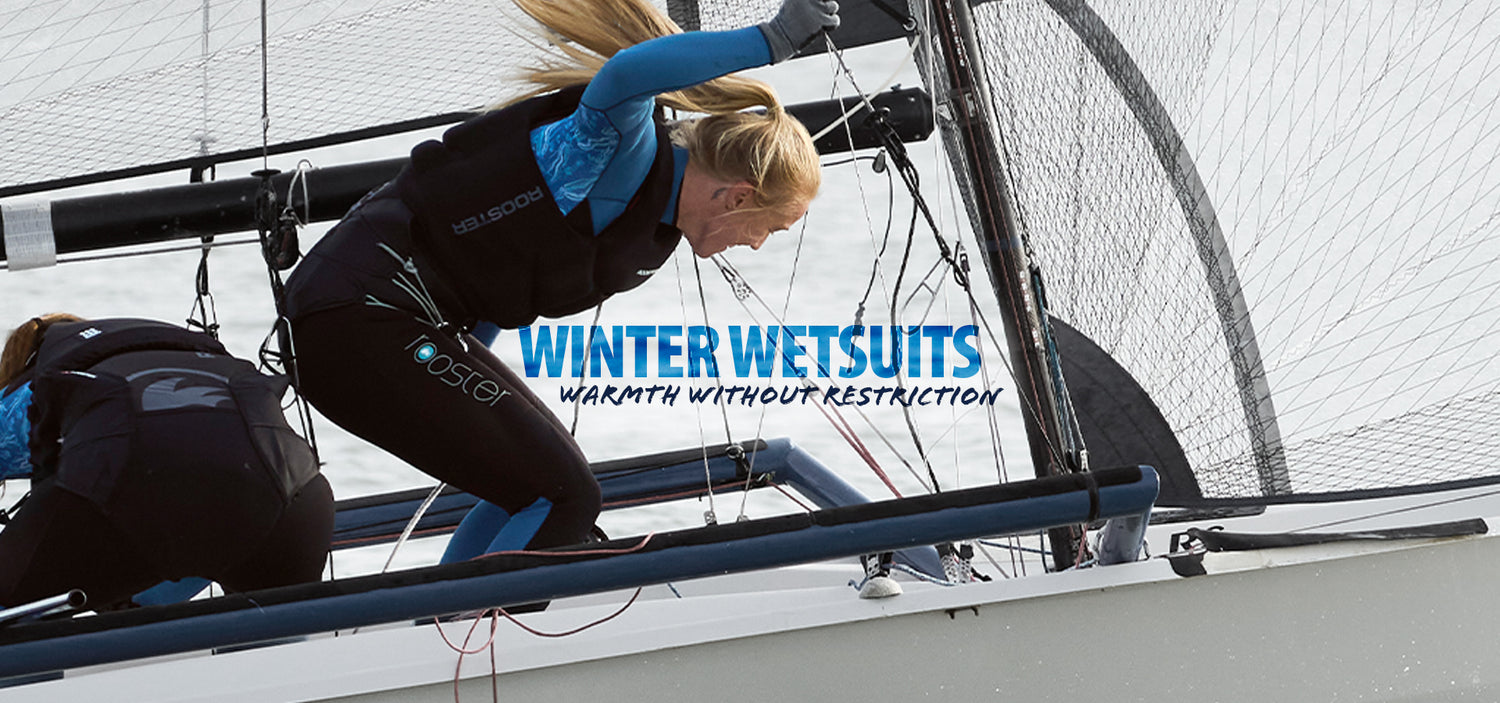Person on a sailboat wearing a winter wetsuit with text overlay.