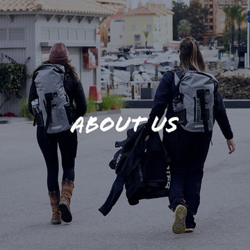 Two people walking with backpacks on a street, with 'ABOUT US' text overlay.