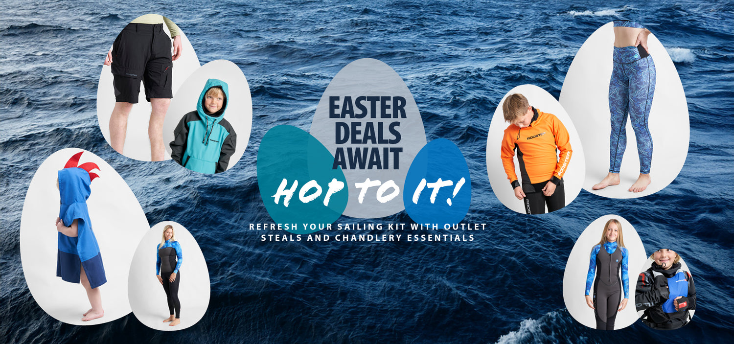 Easter-themed sailing gear sale banner featuring various adults and children in sailing and wetsuit apparel, set against a background of ocean waves. Text in the center reads 'Easter Deals Await – Hop to It! Refresh your sailing kit with outlet steals and chandlery essentials.' Clothing items are displayed in egg-shaped frames to reflect the Easter theme